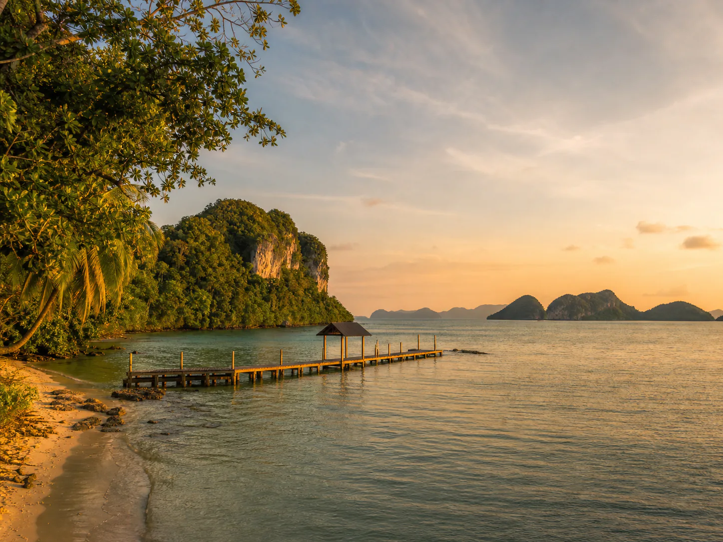 Langkawi coast and limestone islands at golden hour